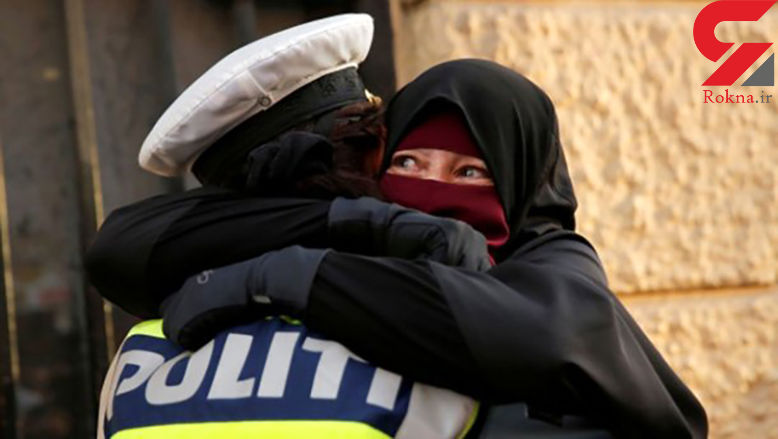 Ø²Ù† Ø¨Ø§Ø­Ø¬Ø§Ø¨ Ø§Ø² ØªØ±Ø³ Ù…Ø§Ù…ÙˆØ± Ù¾Ù„ÛŒØ³ Ø±Ø§ Ø¯Ø± Ø¢ØºÙˆØ´ Ú©Ø´ÛŒØ¯ + Ø¹Ú©Ø³ 