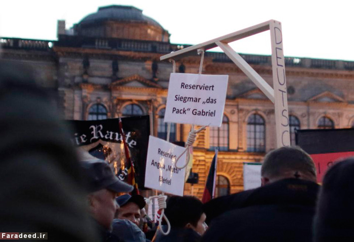 (تصاویر) راهپیمایی علیه مرکل و مهاجران